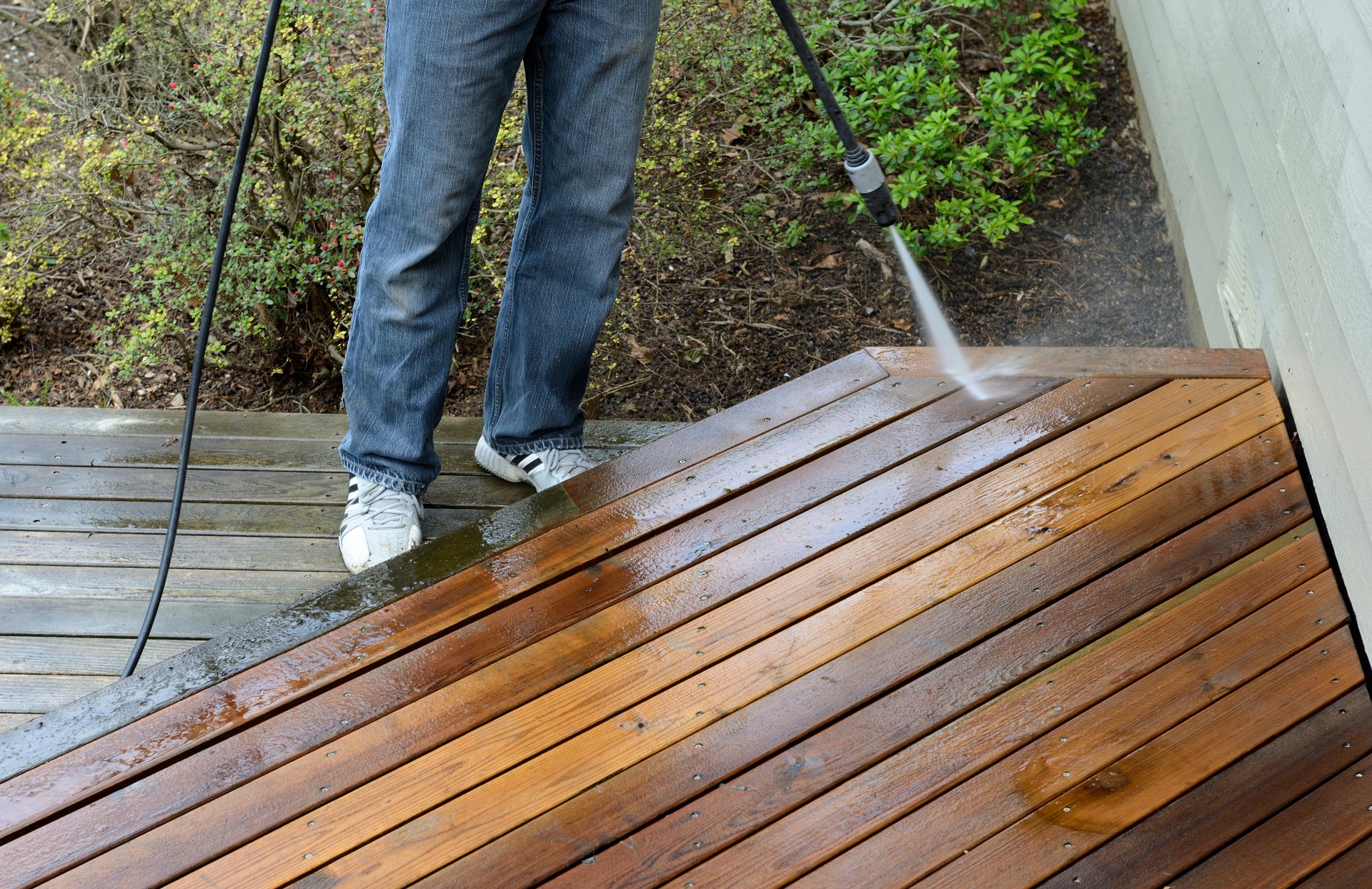 Man Power Washing Deck